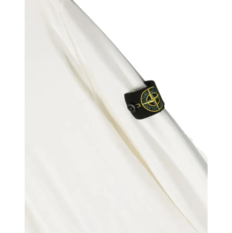Biały sweter z logo na rękawie Stone Island Junior