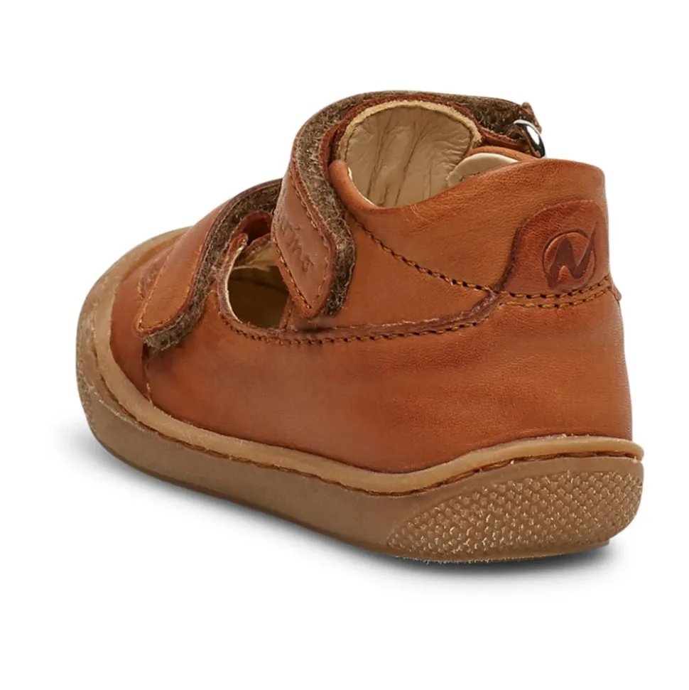 Half-closed sandals PUFFY