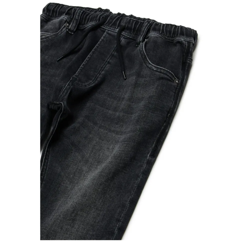 Spodnie JoggJeans o zwężanym kroju z czarnym gradientem - Krooley