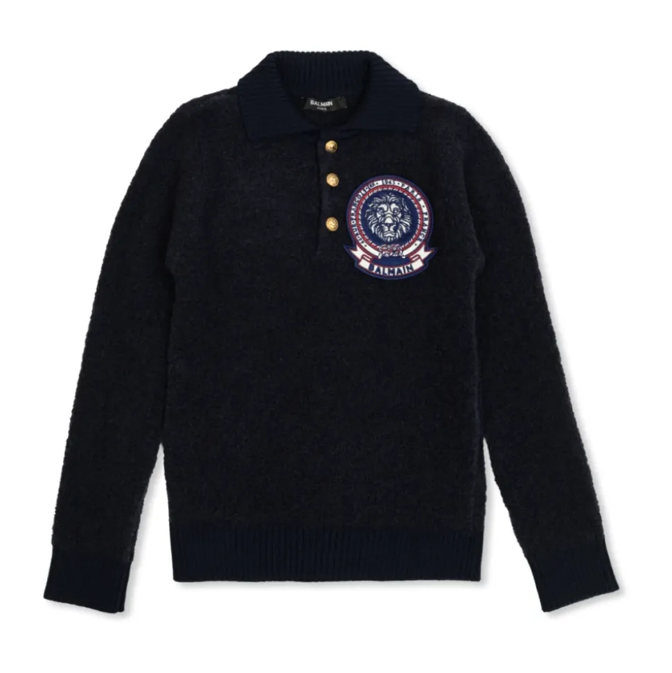 Sweter z naszywką